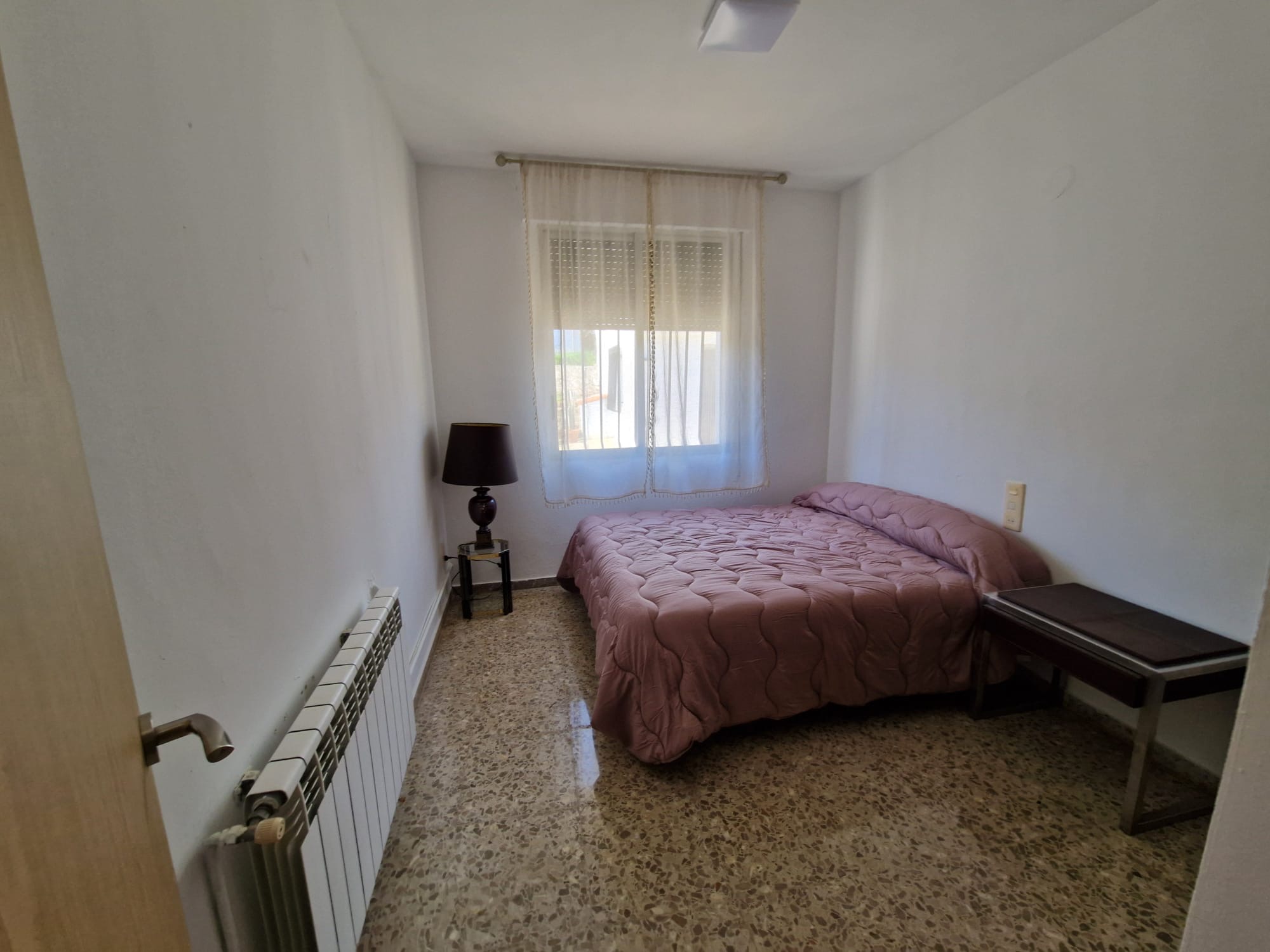 Habitación con cama de matrimonio